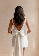 DOVE BOW DRESS WHITE